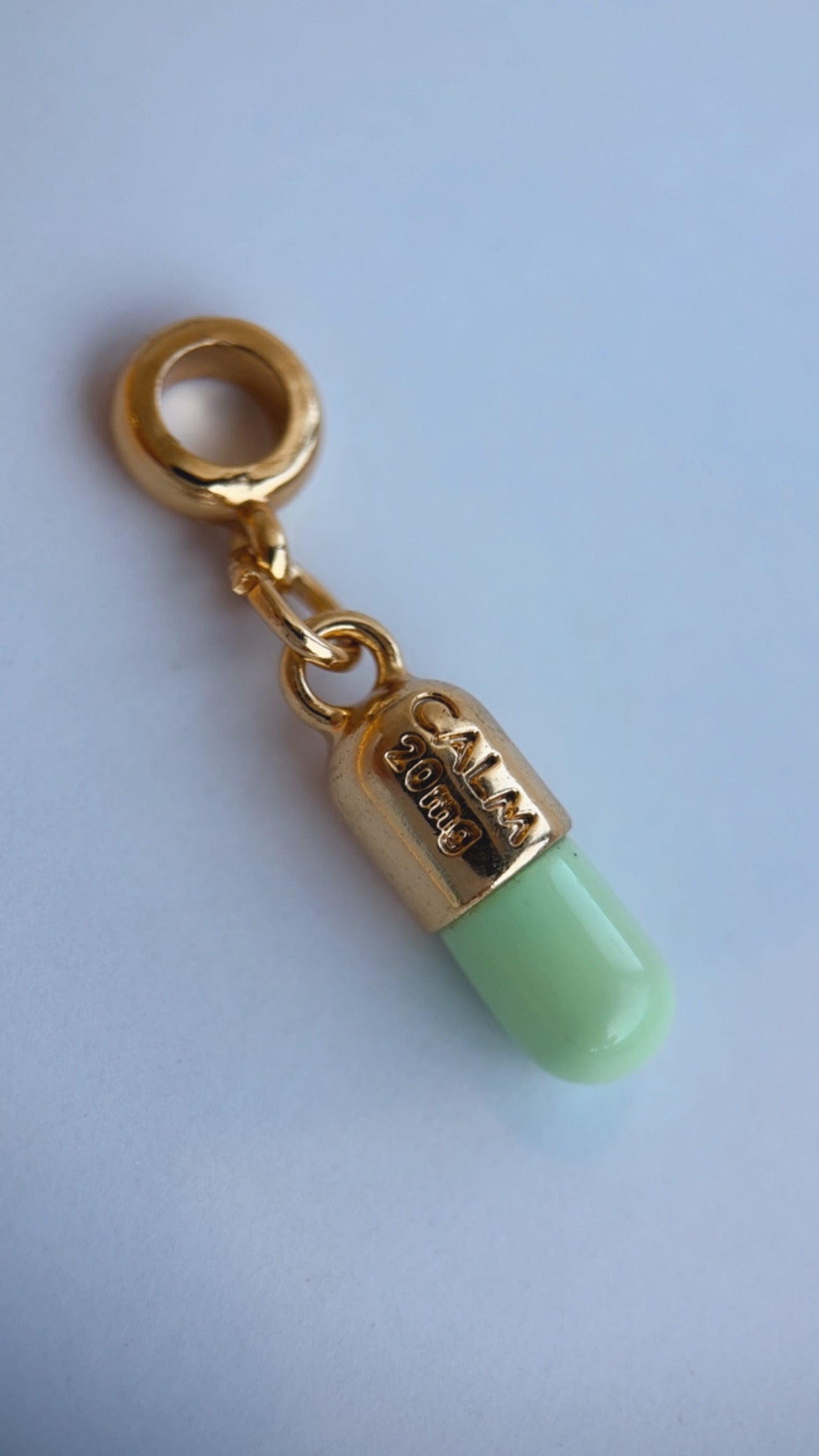 Mini charm pílula