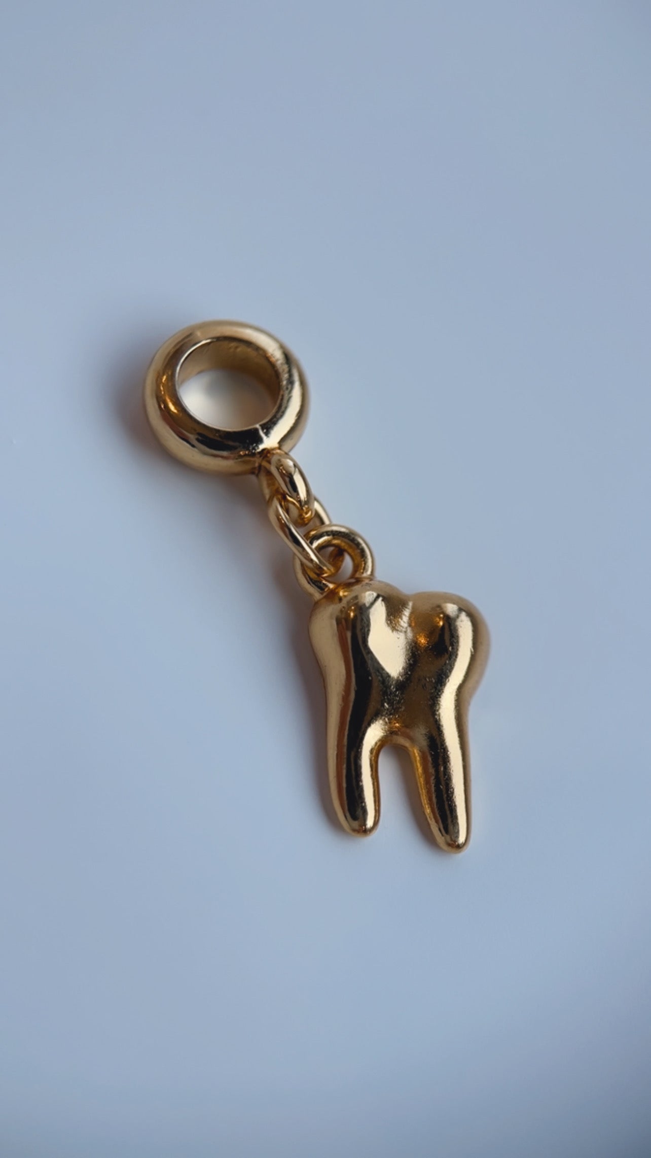 Mini charm dente