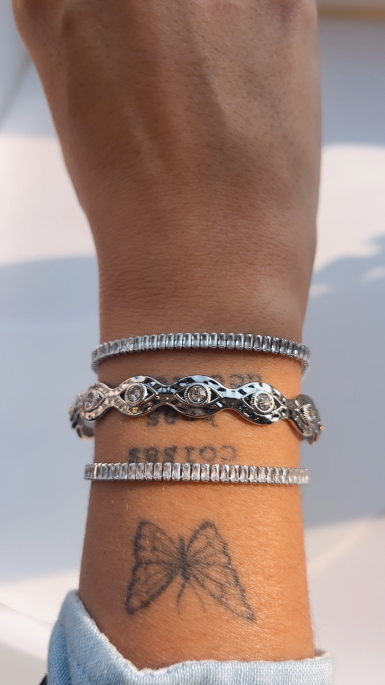 Bracelete olho strass níquel